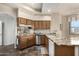 Kitchen features granite countertops, stainless steel appliances, and tile flooring at 7955 E Chaparral Rd # 17, Scottsdale, AZ 85250