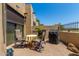 Quaint patio with comfortable seating and grill at 7955 E Chaparral Rd # 17, Scottsdale, AZ 85250