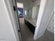 Bright bathroom with dual sinks, black cabinets, and framed mirrors at 9548 E Rainbow Ave, Mesa, AZ 85212