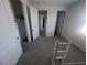 Bright bedroom with ample storage and an adjacent walk in closet at 9548 E Rainbow Ave, Mesa, AZ 85212