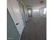 Carpeted bonus room with ample windows and natural light at 9548 E Rainbow Ave, Mesa, AZ 85212