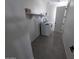 Functional laundry room featuring modern machines and practical shelving at 9548 E Rainbow Ave, Mesa, AZ 85212