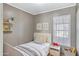 Cozy bedroom with a twin bed, playful decor, and plenty of natural light at 320 E Mckellips Rd # 195, Mesa, AZ 85201