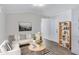 Bright living room with modern decor, featuring a white sofa and stylish round tables at 320 E Mckellips Rd # 195, Mesa, AZ 85201