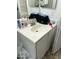 Bathroom vanity with a single white sink, mirror, and essential toiletries, providing a functional space for personal care at 3324 W Mcrae Way # 2, Phoenix, AZ 85027