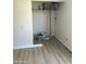 Unorganized closet with new floors. This closet has plenty of storage space for all your needs at 3324 W Mcrae Way # 2, Phoenix, AZ 85027
