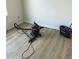Picture of a room being cleaned with light-colored flooring. It appears to be in the process of being remodeled at 3324 W Mcrae Way # 2, Phoenix, AZ 85027