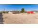 Exterior view of the home showing the house, yard, and red barn at 44446 N 14Th St, New River, AZ 85087