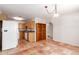 Spacious kitchen with terracotta tile and a large pantry at 44446 N 14Th St, New River, AZ 85087