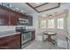 Charming breakfast nook with built-in seating and bright natural light at 7645 W Bluefield Ave, Glendale, AZ 85308