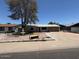 Single level home with desert landscaping and a two car garage at 18415 N 33Rd Ave, Phoenix, AZ 85053