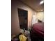 View of cluttered storage area with car at 18415 N 33Rd Ave, Phoenix, AZ 85053