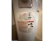 Close up of water heater label at 18415 N 33Rd Ave, Phoenix, AZ 85053
