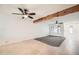 Bright living room showcasing neutral toned walls, tile flooring, and abundant natural light at 2164 E Jerome Ave, Mesa, AZ 85204