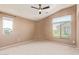 Vaulted ceiling bedroom boasting lots of light from the dual windows at 2725 E Mine Creek Rd # 1149, Phoenix, AZ 85024