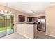 Open kitchen with granite counters, stainless steel appliances, and access to the backyard at 2725 E Mine Creek Rd # 1149, Phoenix, AZ 85024