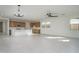 Spacious kitchen features wood cabinetry, sleek white countertops, and modern stainless steel appliances at 2732 N 217Th Ave, Buckeye, AZ 85396