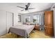 Relaxing bedroom with ceiling fan, neutral tones, and closet at 4065 E University Dr # 76, Mesa, AZ 85205