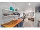 Open-concept living room flows to a modern kitchen, offering plenty of space at 4065 E University Dr # 76, Mesa, AZ 85205