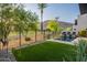 Beautiful backyard with pool, artificial grass and desert landscaping, mountain view at 4544 N Evans Dr, Scottsdale, AZ 85251