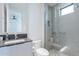 Modern bathroom with sleek vanity, neutral colors, and a frameless shower with gray tiling at 4544 N Evans Dr, Scottsdale, AZ 85251