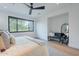 Bright bedroom featuring neutral colors, plush bedding, stylish rug, and plenty of natural light at 4544 N Evans Dr, Scottsdale, AZ 85251