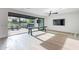 Bright game room with a shuffleboard table, fan and glass doors to a patio at 4544 N Evans Dr, Scottsdale, AZ 85251