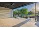 Inviting covered patio overlooking the pool and golf course with ceiling fan at 4544 N Evans Dr, Scottsdale, AZ 85251