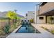 Stunning pool with water features in a modern home with mountain views at 4544 N Evans Dr, Scottsdale, AZ 85251