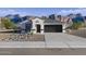 Charming single-story home featuring a modern gray roof and a two-car garage at 2515 S 125Th Dr, Avondale, AZ 85323