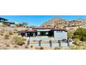 Luxury home with pool and mountain views in the background at 6825 N 39Th Pl, Paradise Valley, AZ 85253