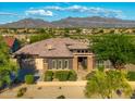 Gorgeous single-Gathering home with mature landscaping and mountain views at 12797 S 179Th Dr, Goodyear, AZ 85338