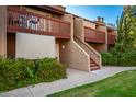 Attractive exterior of a condo building with landscaping and walkways at 14203 N 19Th Ave # 1055, Phoenix, AZ 85023