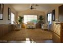 Bright living room showcasing a large window and comfortable seating area at 8103 E Southern Ave # 24, Mesa, AZ 85209