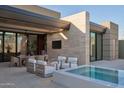 Outdoor patio with seating area and hot tub at 28119 N 109Th Way, Scottsdale, AZ 85262