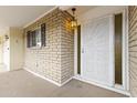 Front entrance with security door and light fixture at 6315 E Billings St, Mesa, AZ 85205