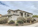 Two story home with covered entryway and desert landscaping at 4803 E Barwick Dr, Cave Creek, AZ 85331