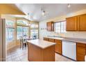 Kitchen boasts an island, ample cabinetry, and a breakfast nook at 6145 E Sierra Morena St, Mesa, AZ 85215