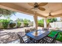 Covered patio with seating area and putting green at 6145 E Sierra Morena St, Mesa, AZ 85215