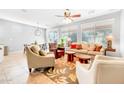 Bright and airy living room with comfortable seating and large windows at 29110 N 129Th Ave, Peoria, AZ 85383