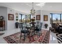 Elegant dining area with glass table and stunning views at 1040 E Osborn Rd # 302, Phoenix, AZ 85014