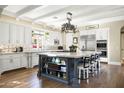 Spacious kitchen with large island, stainless steel appliances, and white cabinets at 10287 E Diamond Rim Dr, Scottsdale, AZ 85255