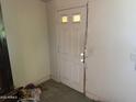 Interior shot of a white door with a switchplate to the right of the door at 1535 E Christy Dr, Phoenix, AZ 85020