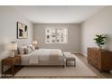Serene bedroom with neutral tones, ample natural light, and modern furnishings at 7930 E Camelback Rd # 506, Scottsdale, AZ 85251