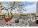 Outdoor patio with dining table and seating offering beautiful views at 18315 W Santa Alberta Ln, Goodyear, AZ 85338