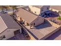 Aerial view of backyard showcasing the property's fenced perimeter and low maintenance landscape at 37108 W Bello Ln, Maricopa, AZ 85138