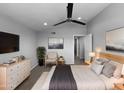 Comfortable main bedroom with a ceiling fan, closet, and an ensuite bathroom at 4925 N 73Rd St # 4, Scottsdale, AZ 85251
