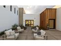 Relaxing courtyard area with comfortable seating and modern design elements perfect for outdoor lounging at 4350 N Jokake Dr, Scottsdale, AZ 85251