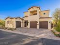 Striking two-story home with a tile roof, desert landscaping, and three-car garage at 3955 E Sierra Vista Dr, Paradise Valley, AZ 85253