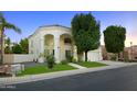 Two-story house with a landscaped front yard at 1521 W Commerce Ave, Gilbert, AZ 85233